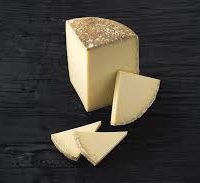 Tartelette croustillante au Cantal et asperges de pays, syphon agrumes, émulsion à la pancetta et moutarde de Charroux